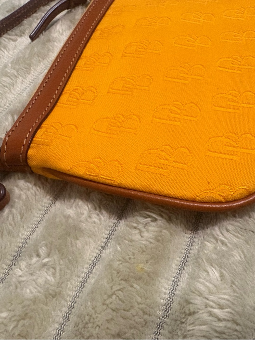 Dooney & Bourke Dandelion Coated cotton/orange Embossed DB Wristlet w/Brown Trim - Picture 3 of 8